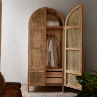 Armoire en rotin et bois forme arc de cercle avec tiroirs et portant LIZY
