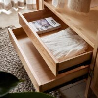 Armoire en rotin et bois forme arc de cercle avec tiroirs et portant LIZY