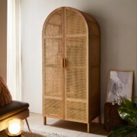 Armoire en rotin et bois forme arc de cercle avec tiroirs et portant LIZY
