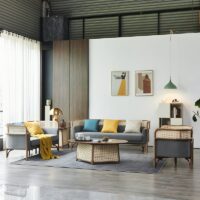 Fauteuil en rotin tressé et bambou avec coussin gris moderne tendance ALBERT