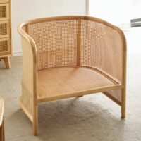 Fauteuil en rotin et bois avec coussins forme arrondie confortable ACHIL