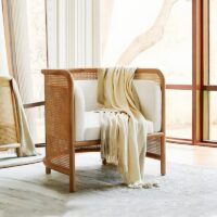 Fauteuil en rotin et bois avec coussins forme arrondie confortable ACHIL